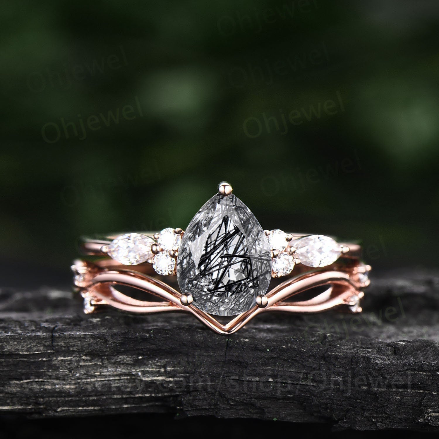 Pear shaped black rutilated quartz engagement ring set rose gold